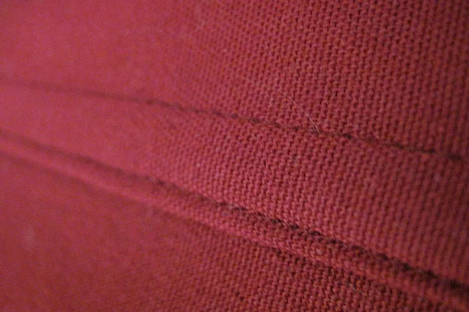 A flat felled seam on a garment shown in close up